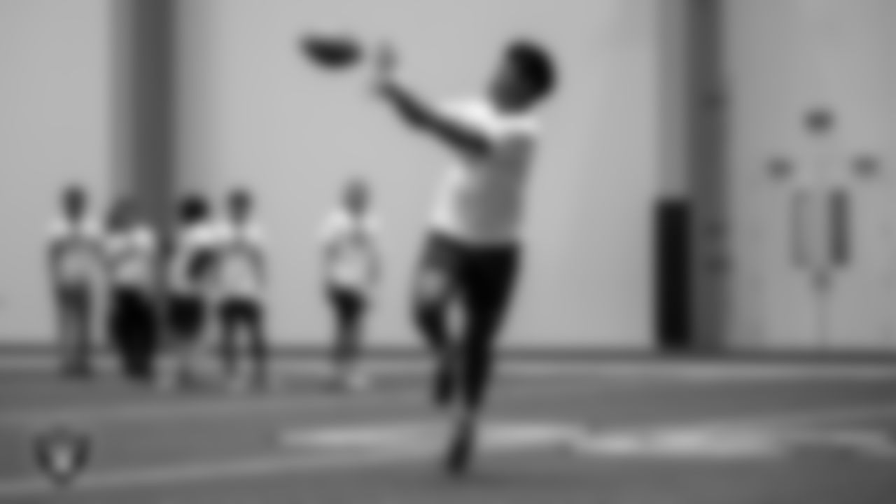An athlete participates in drills during the ELITE Academy at the Las Vegas Raiders Headquarters.