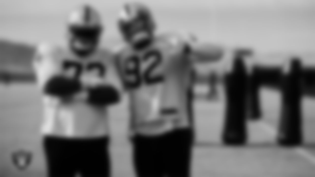 Las Vegas Raiders defensive tackle Maurice Hurst (73) and defensive end Chris Smith (92) during practice at Intermountain Healthcare Performance Center.