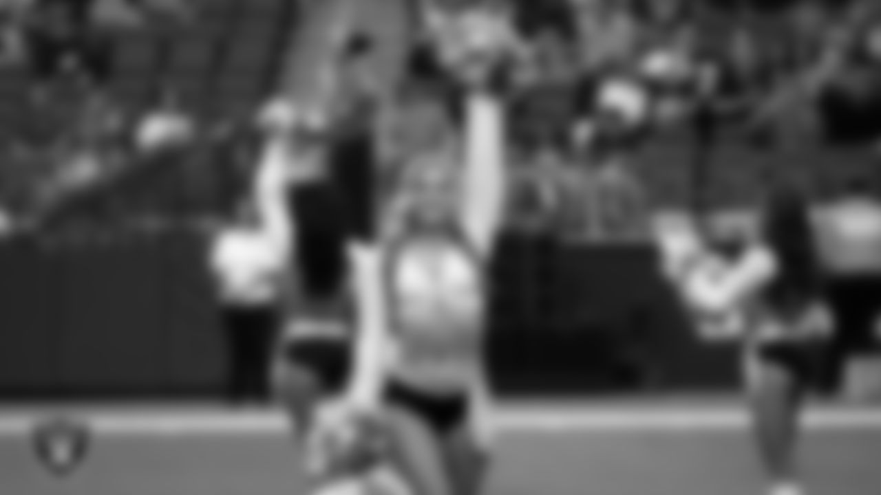 Raiderette Kennedy during player introductions before the regular season home game against the Houston Texans at Allegiant Stadium.