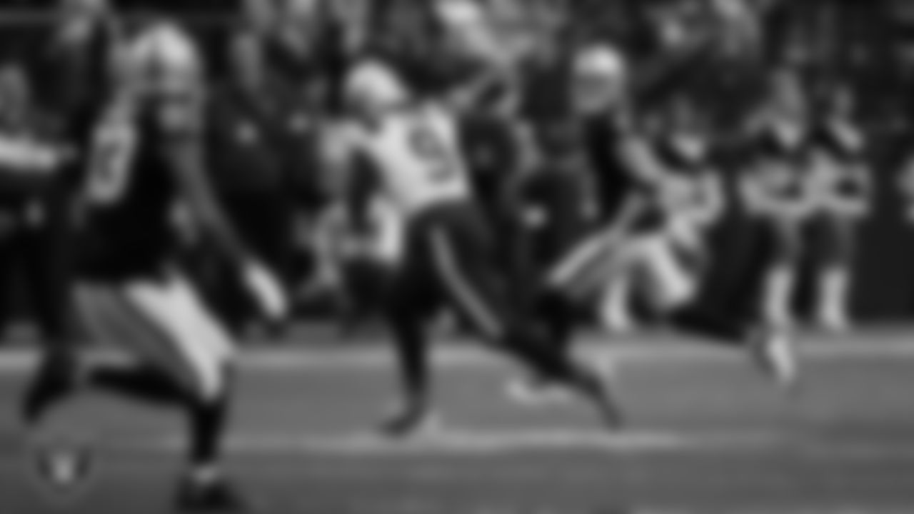 Las Vegas Raiders quarterback Derek Carr (4) looks for a receiver during the regular season home game against the New England Patriots at Allegiant Stadium.