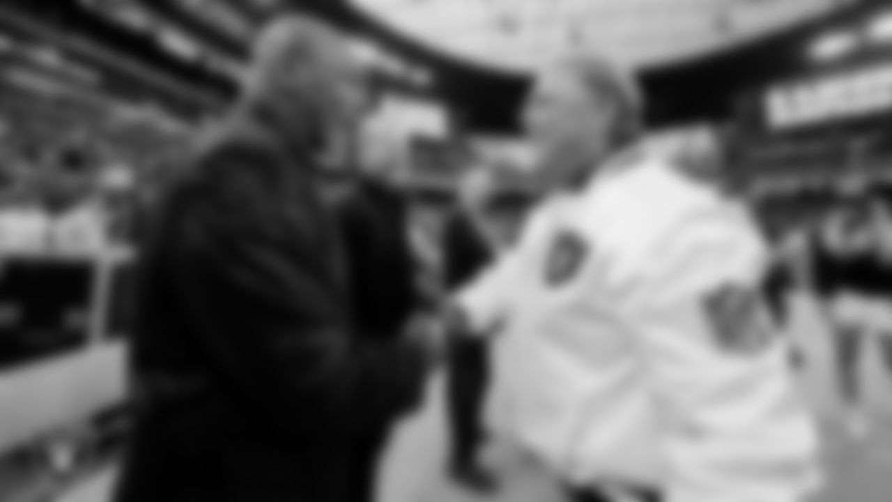 Las Vegas Raiders Owner Mark Davis and professional boxer Mike Tyson before the regular season home game against the Pittsburgh Steelers at Allegiant Stadium.