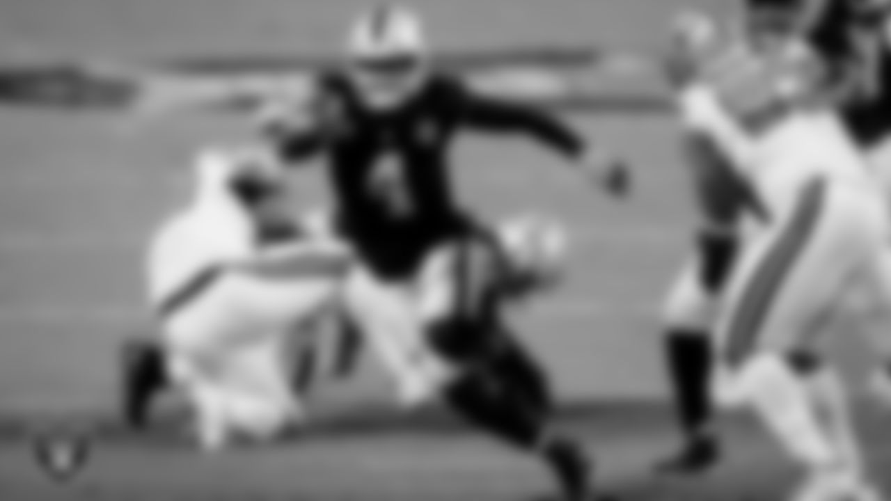 Las Vegas Raiders quarterback Derek Carr (4) rushes during the regular season home game against the New Orleans Saints.