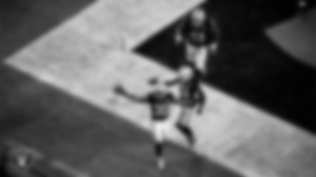 Las Vegas Raiders running back Jalen Richard (30) celebrates after rushing for a 20-yard touchdown during the regular season home game against the New Orleans Saints.