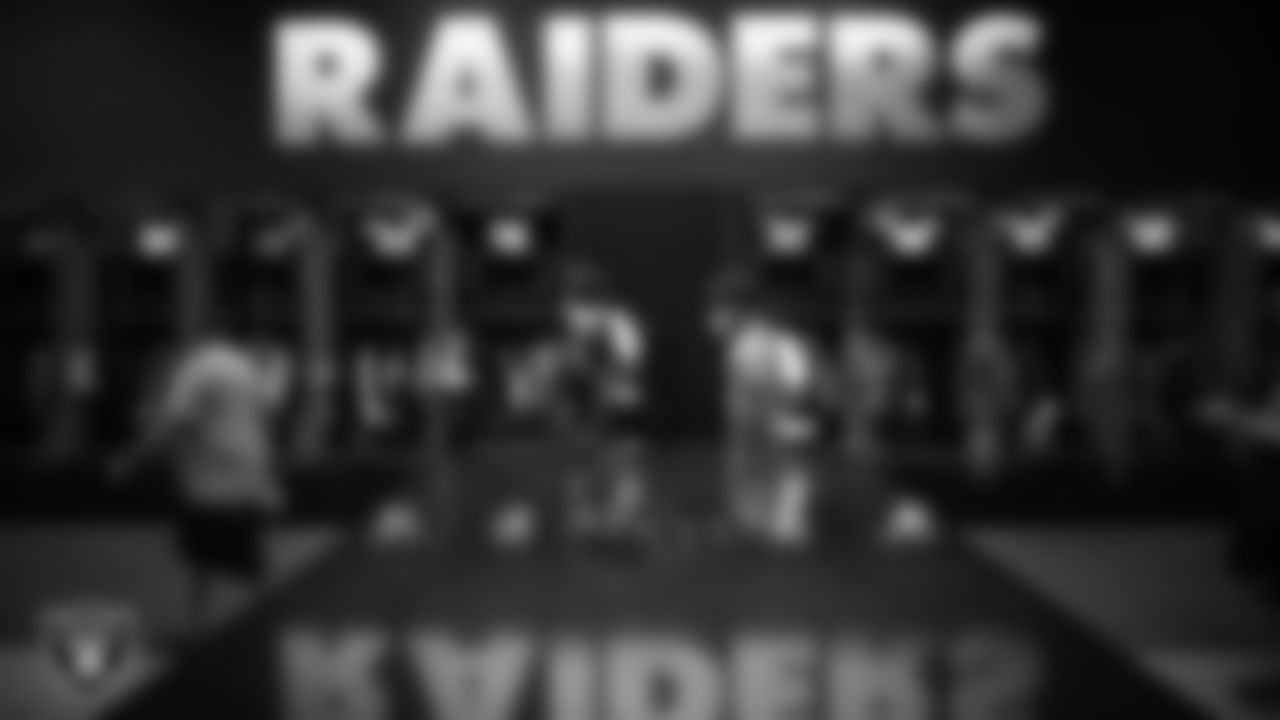Las Vegas Raiders wide receiver Henry Ruggs III (11) and running back Lynn Bowden Jr. (33) take a tour of the locker room after arriving for 2020 Training Camp.