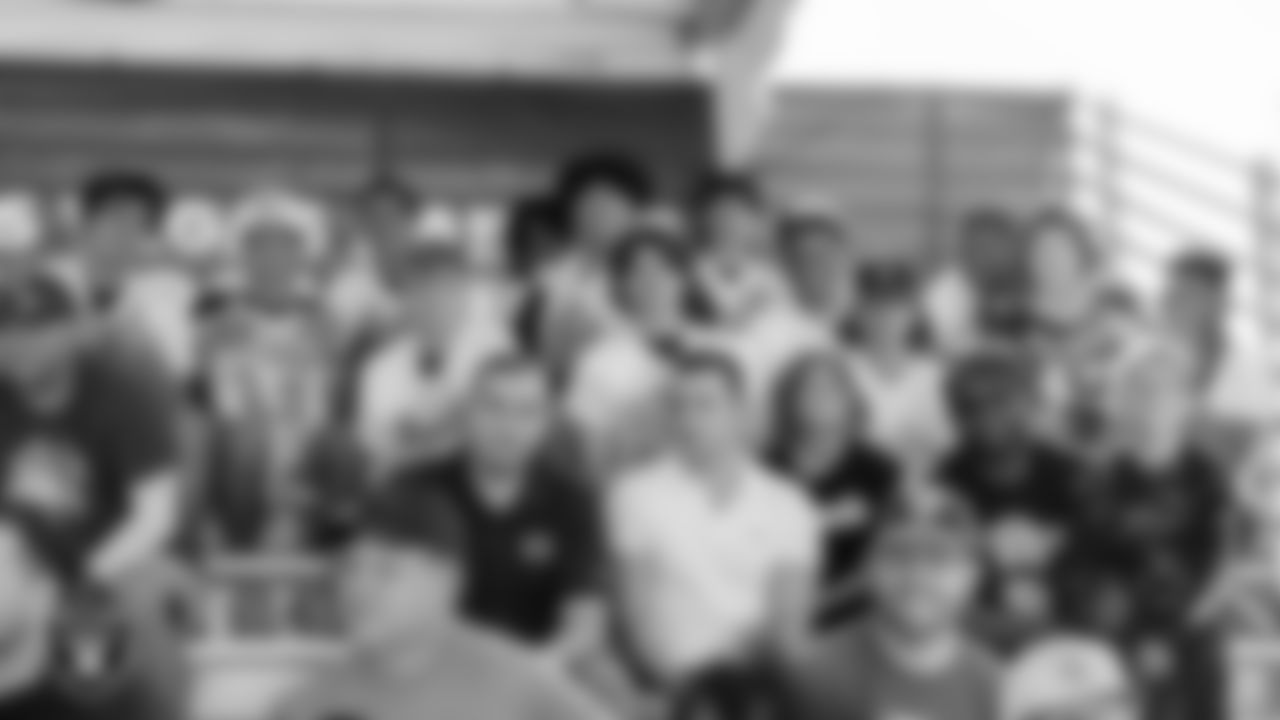 The Clark High School football team in the stands at 2022 Training Camp at Intermountain Healthcare Performance Center.