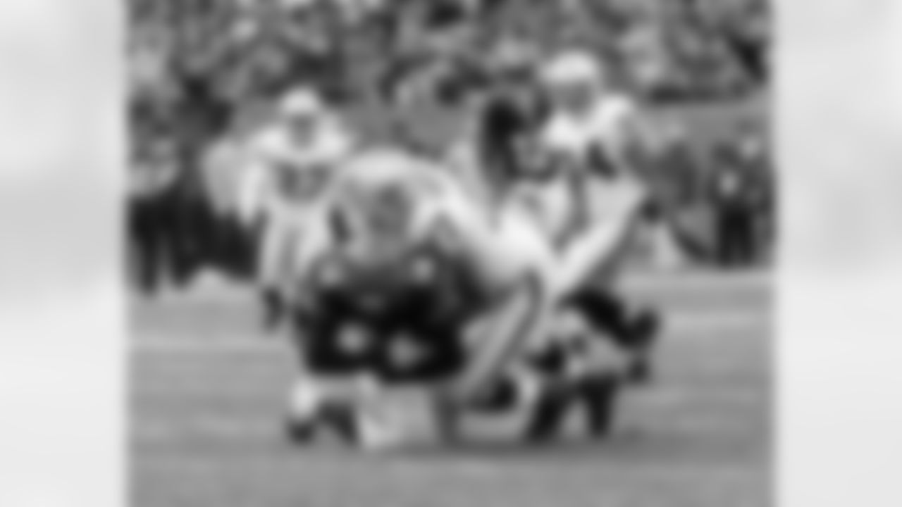 DE Matt Shaughnessy sacks the quarterback.