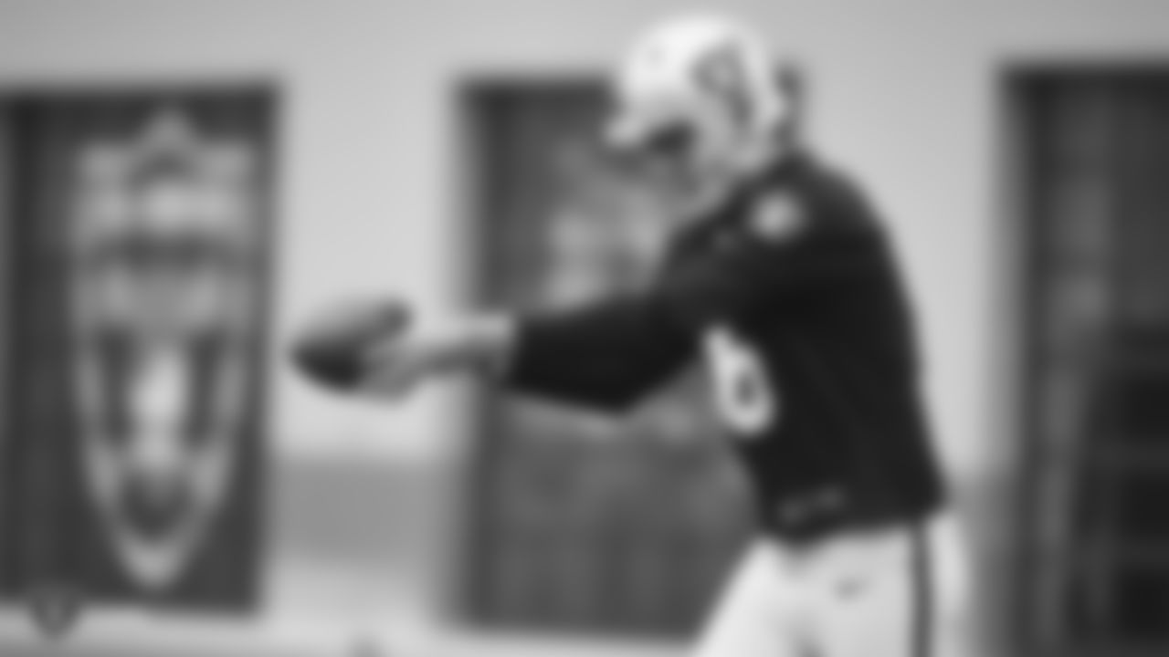Raiders punter AJ Cole (6) punts during practice.
