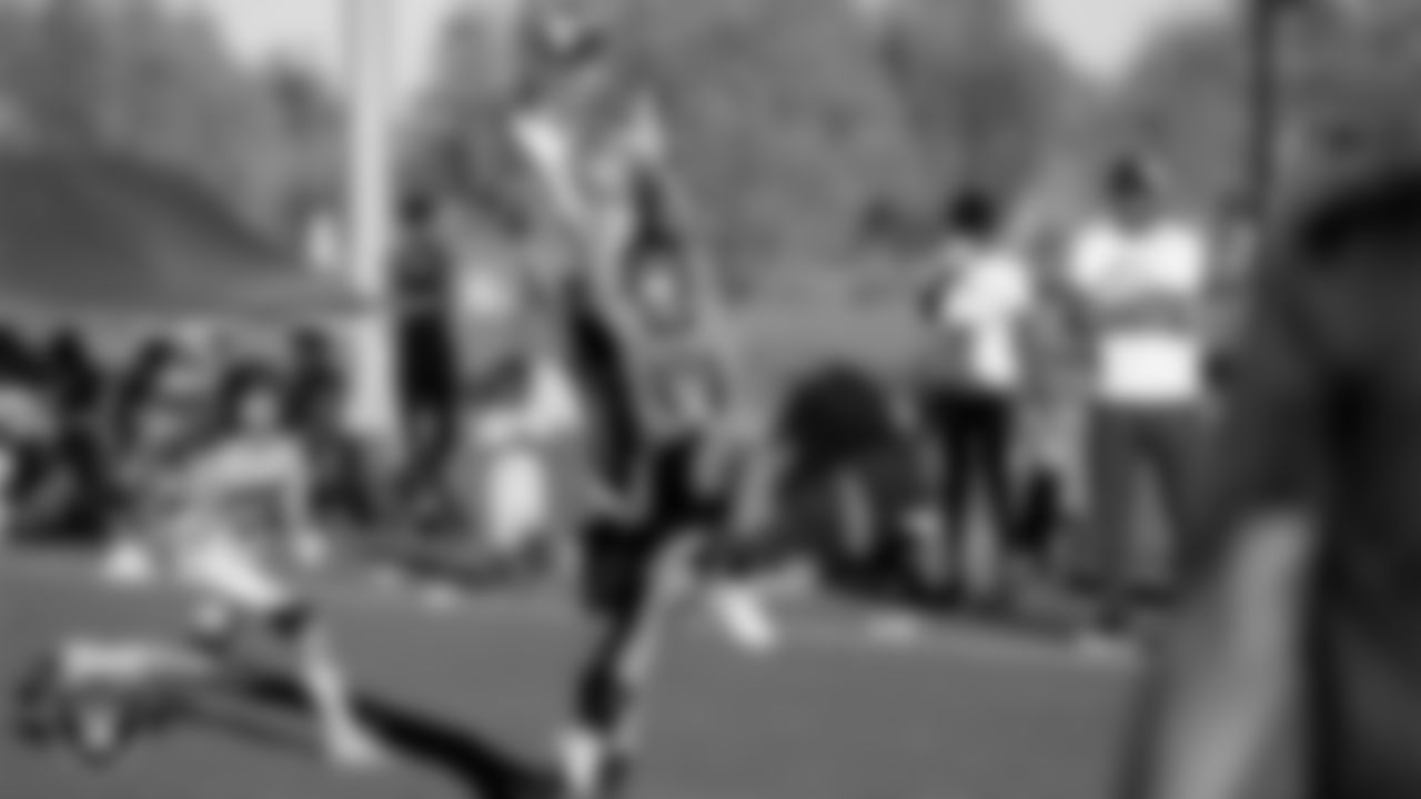 Athletes participate in a game during the season Silver and Black Flag Football League championship games at Teton Trails Park.