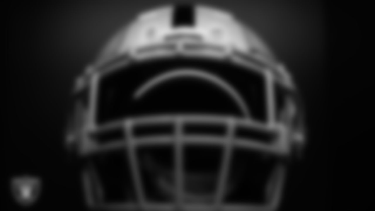 A Las Vegas Raiders helmet in the locker room prior to the Raiders' arrival for their preseason home game against the New England Patriots at Allegiant Stadium.