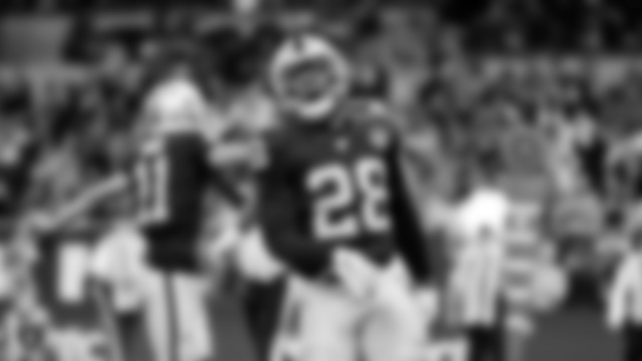 Raiders running back Josh Jacobs (28) celebrates after rushing for a 12-yard touchdown during the game against the Chicago Bears at Tottenham Hotspur Stadium.