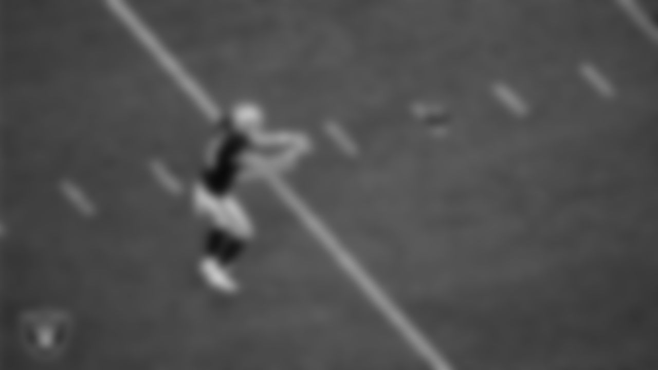 Las Vegas Raiders punter AJ Cole (6) receives the snap during the regular season home game against the Green Bay Packers at Allegiant Stadium.