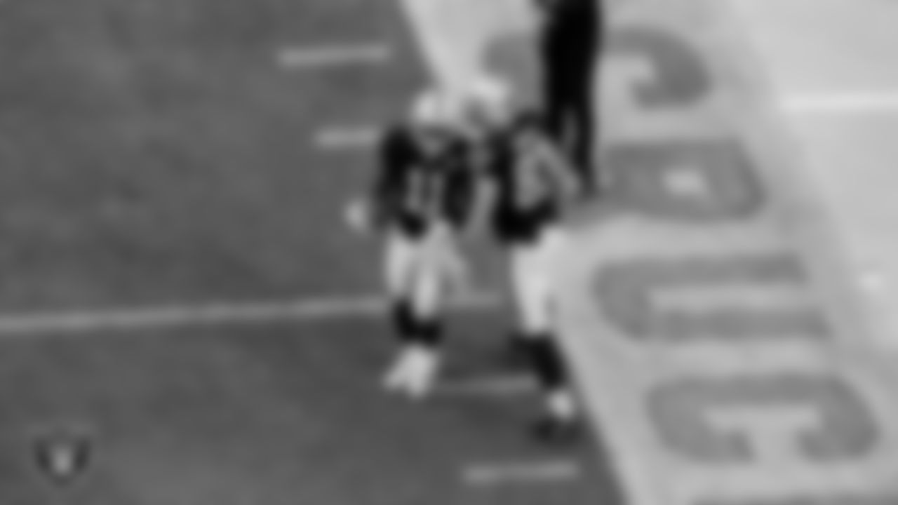 Las Vegas Raiders wide receiver Henry Ruggs III (11) and tight end Foster Moreau (87) during the regular season game against the Tampa Bay Buccaneers at Allegiant Stadium.