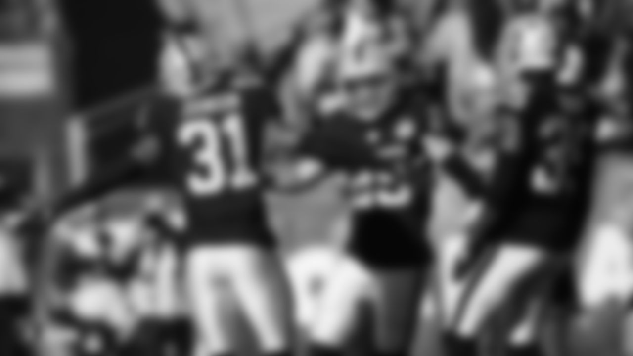 Raiders cornerback Isaiah Johnson (31), safety Erik Harris (25) and safety Curtis Riley (35) celebrate during the regular season game against the Cincinnati Bengals.