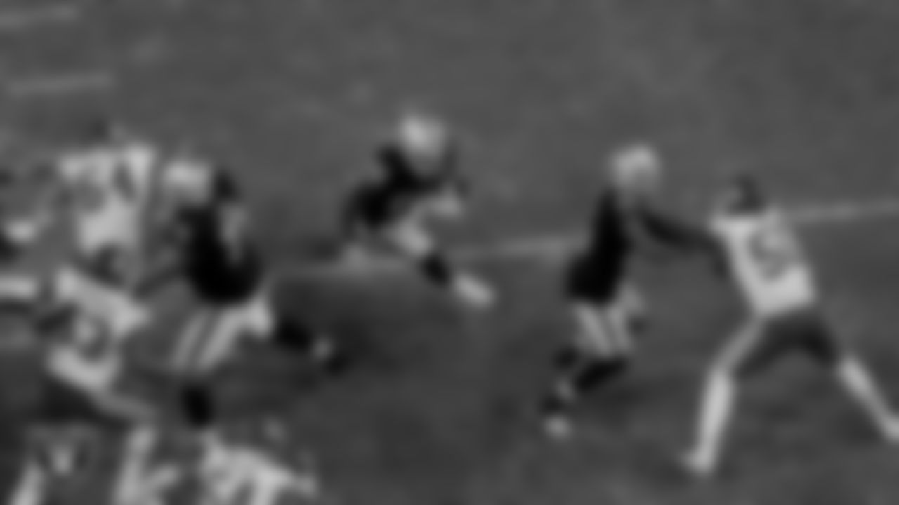Las Vegas Raiders tackle Denzelle Good (71), running back Josh Jacobs (28) and wide receiver Nelson Agholor (15) during the regular season game against the Kansas City Chiefs at Allegiant Stadium.