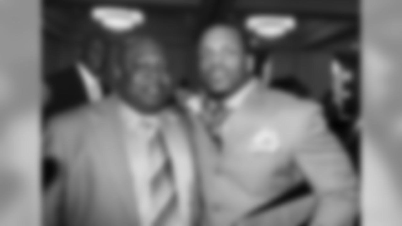 Rock Cartwright with his running backs coach Kelly Skipper.