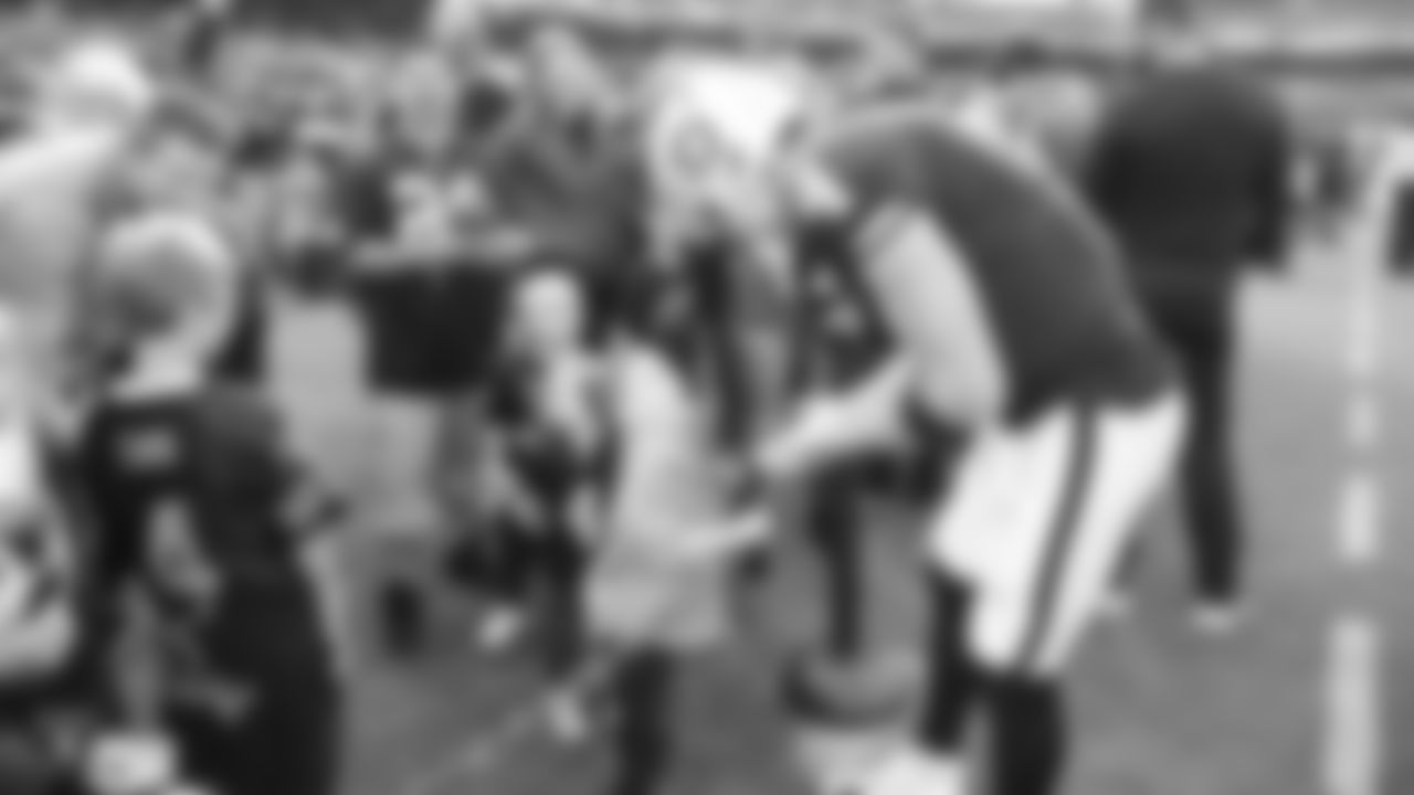 Oakland Raiders quarterback Derek Carr (4) interacts with fans before The Oakland Raiders preseason game against the Green Bay Packers at Oakland-Alameda County Coliseum, Friday, August 24, 2018, in Oakland, California. The Oakland Raiders won 13-6.