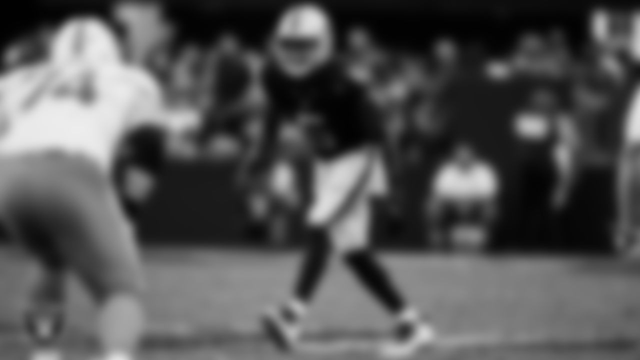 Las Vegas Raiders linebacker Divine Deablo (5) lines up before the snap during the regular season home game against the Miami Dolphins at Allegiant Stadium.