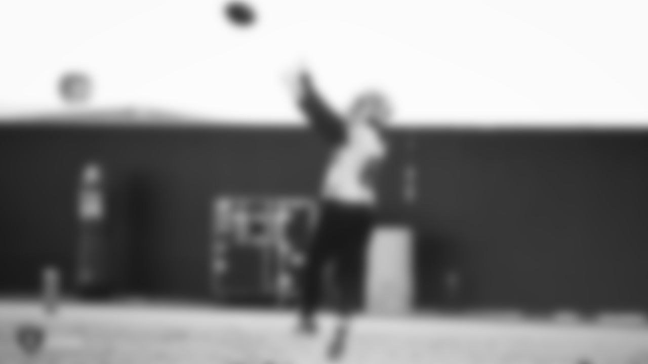 Raiders tight end Darren Waller (83) goes for a catch during practice.
