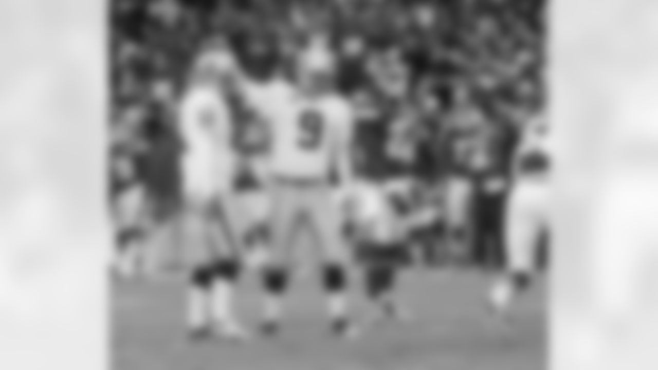 The kicking duo congratulate each other after another successful field goal.
