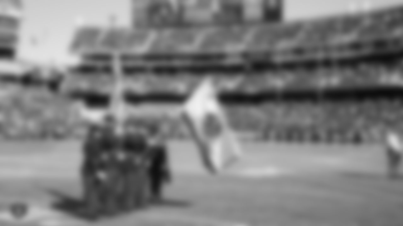 Weston Ranch High School presents the nation's colors during the national anthem before the Raiders preseason game against the Los Angeles Rams.