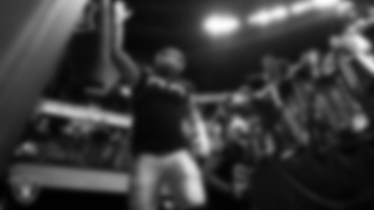 Las Vegas Raiders defensive end Maxx Crosby (98) and defensive tackle Johnathan Hankins (90) walk down the tunnel before the regular season home game against the Washington Football Team.