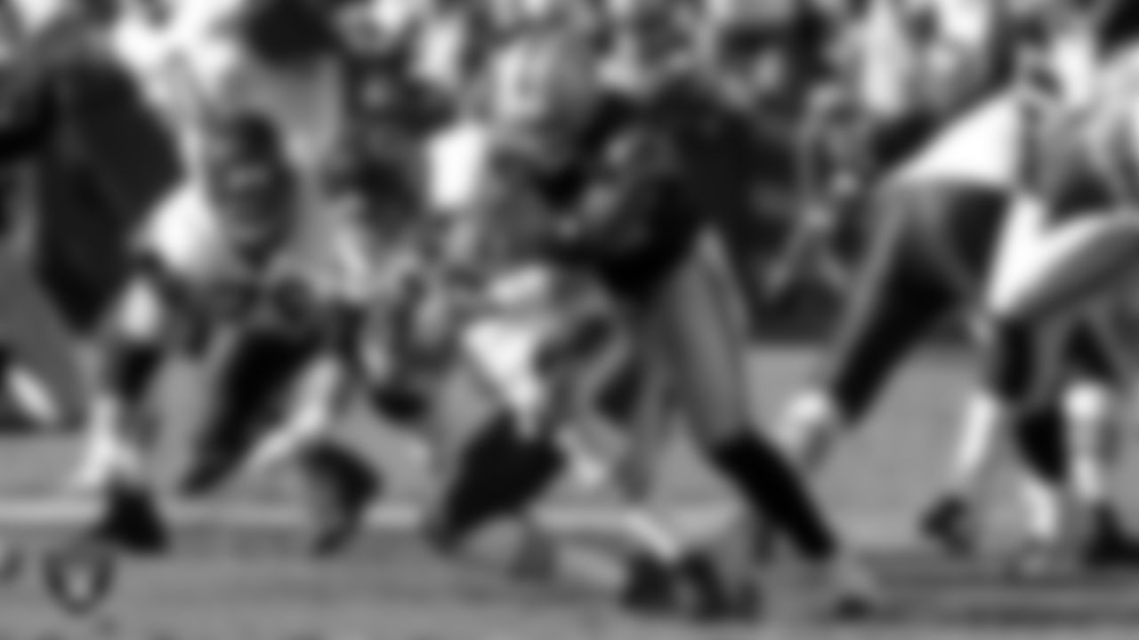 Oakland Raiders linebacker Kirk Morrison (52) sacks the quarterback during the regular season home game against the Chicago Bears at McAfee Coliseum, Sunday, November 11, 2007, in Oakland, Calif.