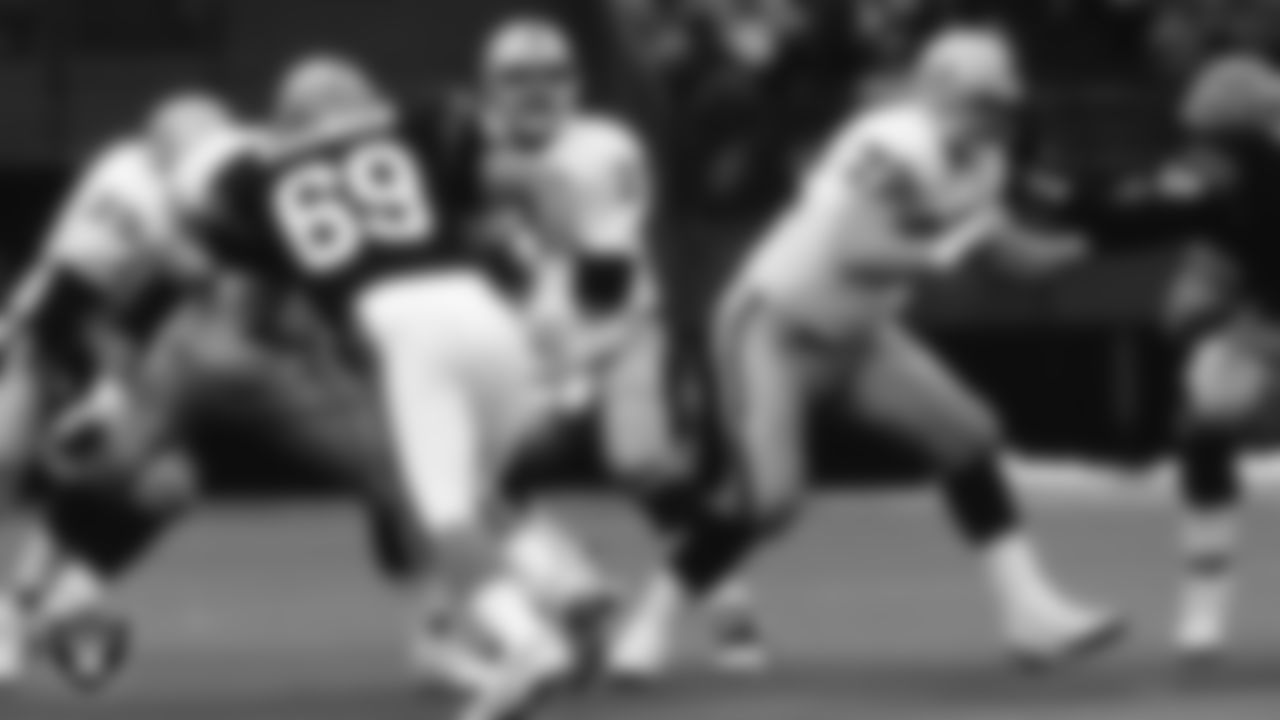 Los Angeles Raiders quarterback Jeff Hostetler (15) looks for a receiver as center/guard/tackle Don Mosebar (72) block during the regular season away game against the Cincinnati Bengals at Riverfront Stadium, Sunday, November 28, 1993, in Cincinnati, Ohio.