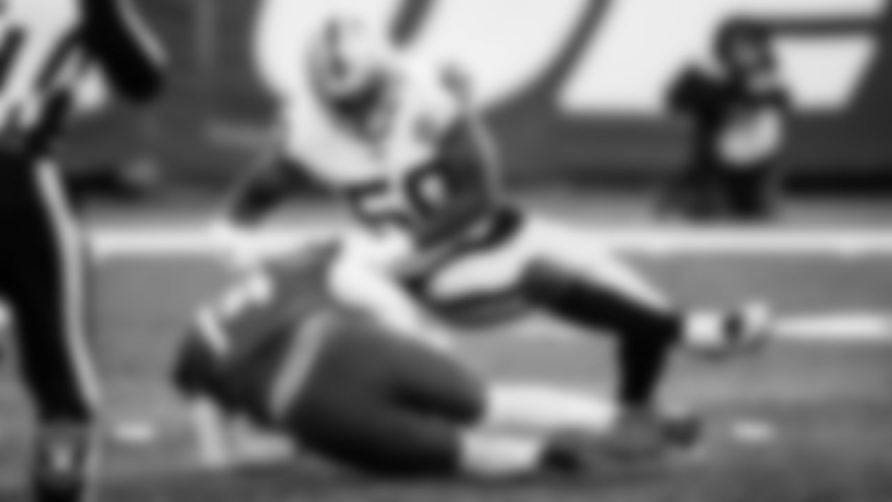Las Vegas Raiders linebacker Nicholas Morrow (50) sacks the quarterback during the regular season away game against the New York Jets.