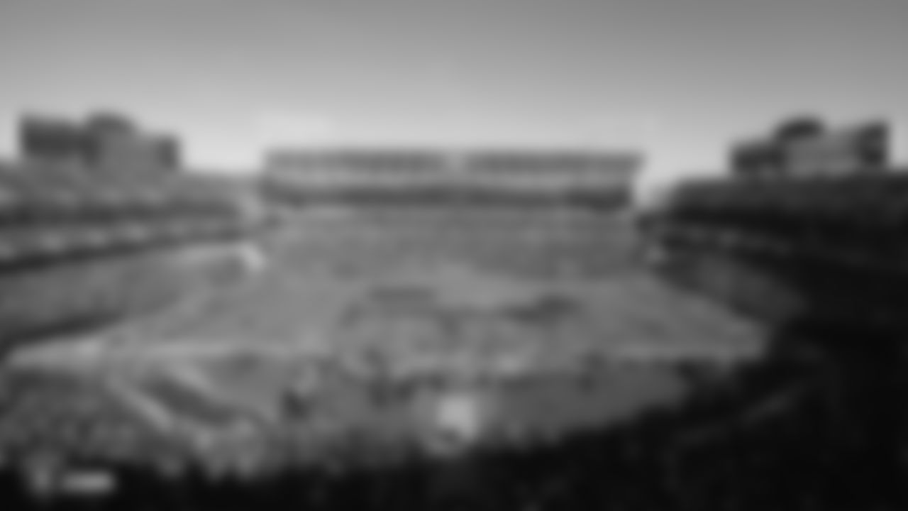 The American flag is displayed by members from the 91st Division of Army, 23rd Marine Regiment of the Marine Corps, Beale Air Force Base and U.S. Coast Guard Base Alameda on the field during the national anthem before the Raiders regular season game against the Cincinnati Bengals.