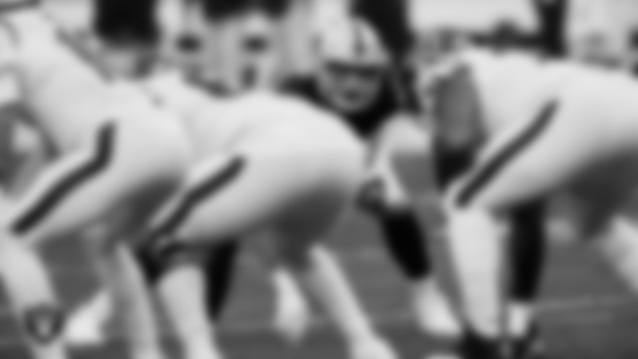 Las Vegas Raiders defensive end Maxx Crosby (98) eyes the offense during the regular season home game against the Houston Texans at Allegiant Stadium.