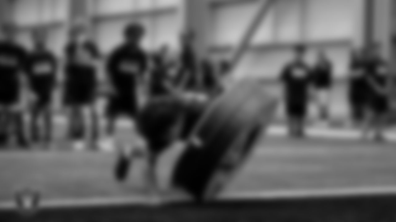 An athlete participates in a drill during the Raiders Play Football Skills Camp at Intermountain Health Performance Center.