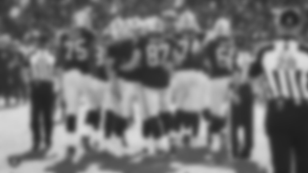The Raiders celebrate after a PAT during the regular season game against the Cincinnati Bengals at the Oakland-Alameda County Coliseum.