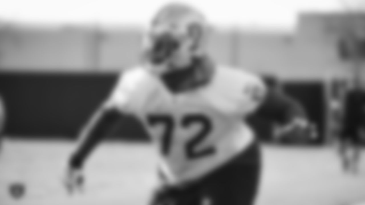 Raiders tackle David Sharpe (72) goes through offensive drills during practice.