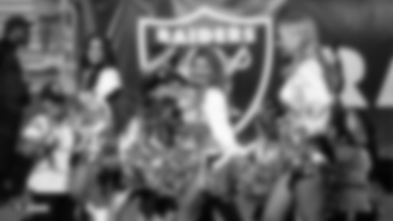 The Raiderettes and Junior Raiderettes before the Raiders game against the Los Angeles Rams.