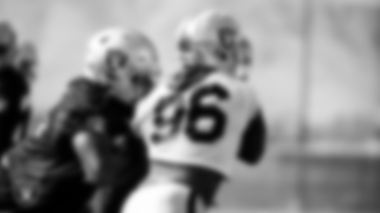Las Vegas Raiders guard John Simpson (76) and defensive end Clelin Ferrell (96) during practice.