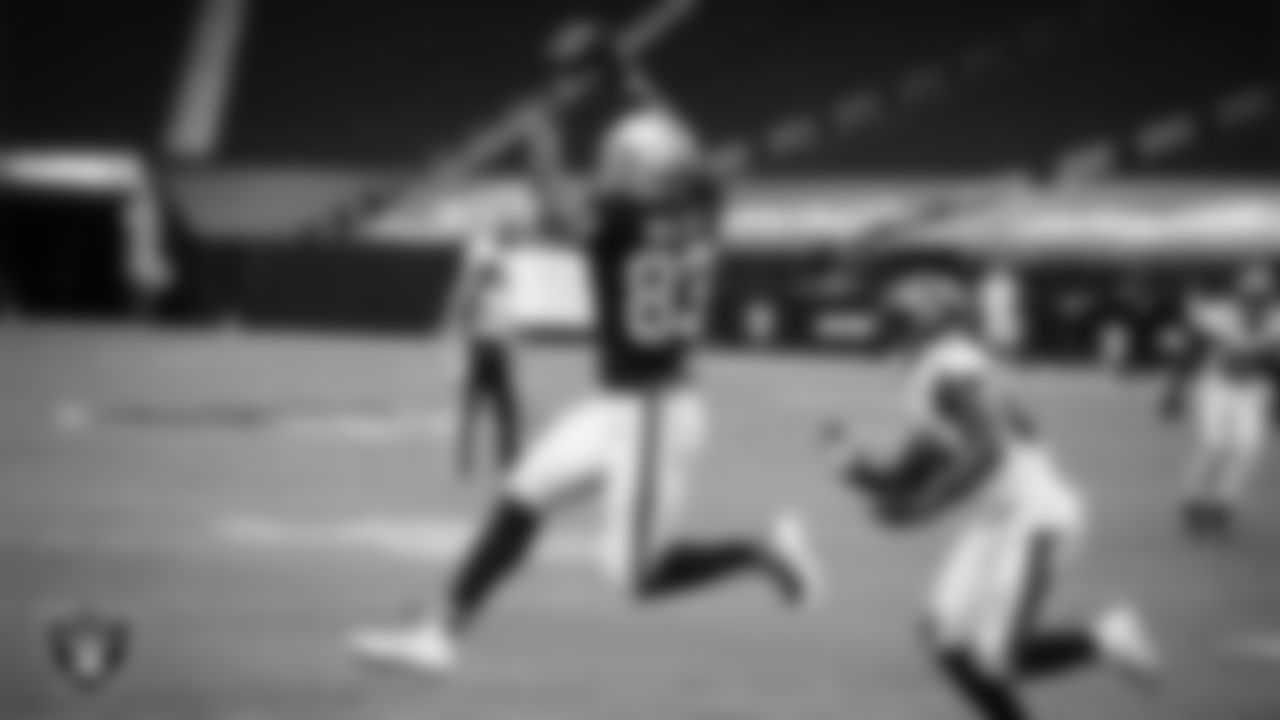 Las Vegas Raiders tight end Darren Waller (83) goes up for a catch during the regular season home game against the Tampa Bay Buccaneers.