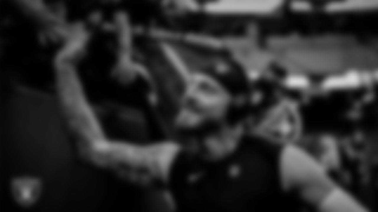 Las Vegas Raiders defensive end Maxx Crosby (98) with fans before the regular season home game against the Arizona Cardinals at Allegiant Stadium.