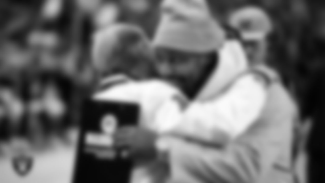Las Vegas Raiders Owner Mark Davis and alumnus Marshawn Lynch before the Las Vegas Raiders' regular season home game against the Green Bay Packers at Allegiant Stadium.