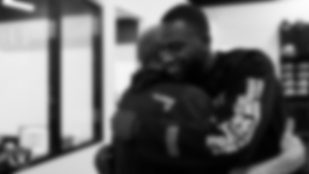 Las Vegas Raiders cornerback Brandon Facyson (31) shares a hug with equipment manager Bob Romanski during a tour of Intermountain Healthcare Performance Center.