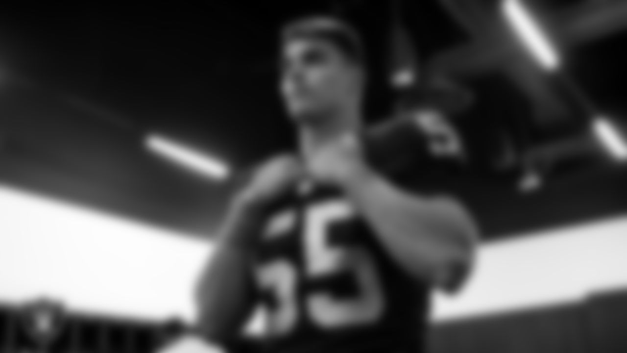 Las Vegas Raiders linebacker Tanner Muse tries on his jersey and pads after arriving for 2020 Training Camp.