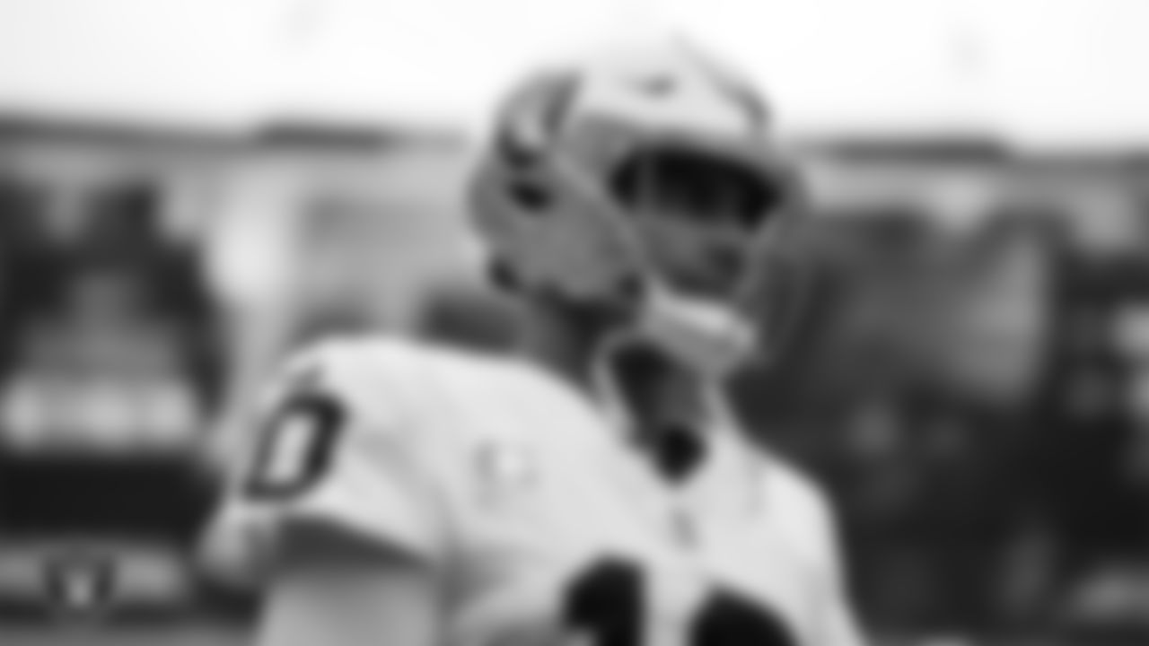 Las Vegas Raiders quarterback Jimmy Garoppolo (10) warming up before the regular season away game against the Denver Broncos at Empower Field at Mile High.