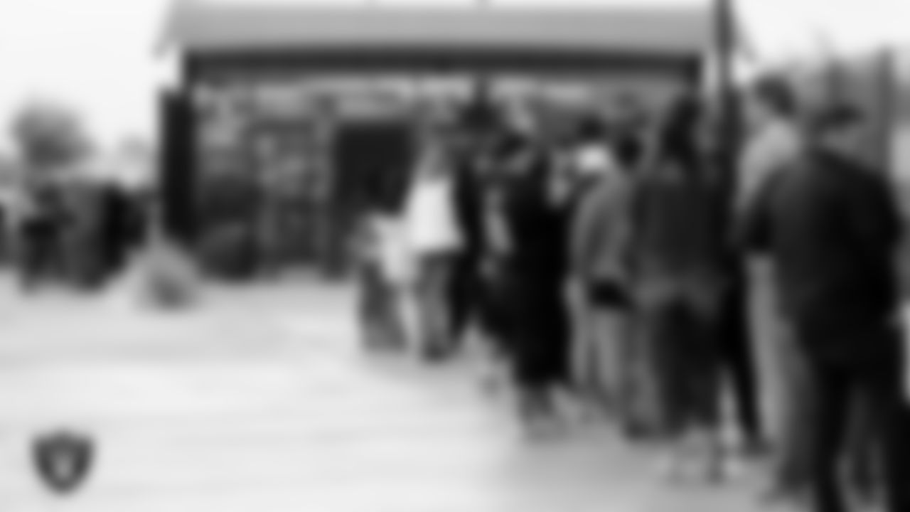 Season Ticket Holders line up outside of Allegiant Stadium before the appreciation event.