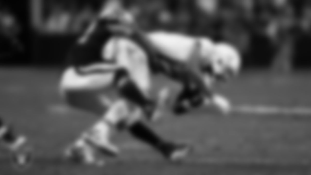 Las Vegas Raiders linebacker Denzel Perryman (52) makes a tackle during the regular season home game against the Los Angeles Chargers.