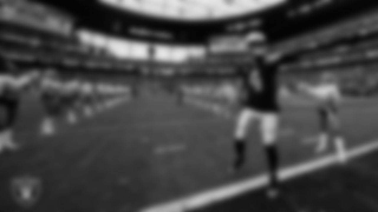 Las Vegas Raiders quarterback Derek Carr (4) is introduced onto the field before the regular season home game against the Washington Football Team.