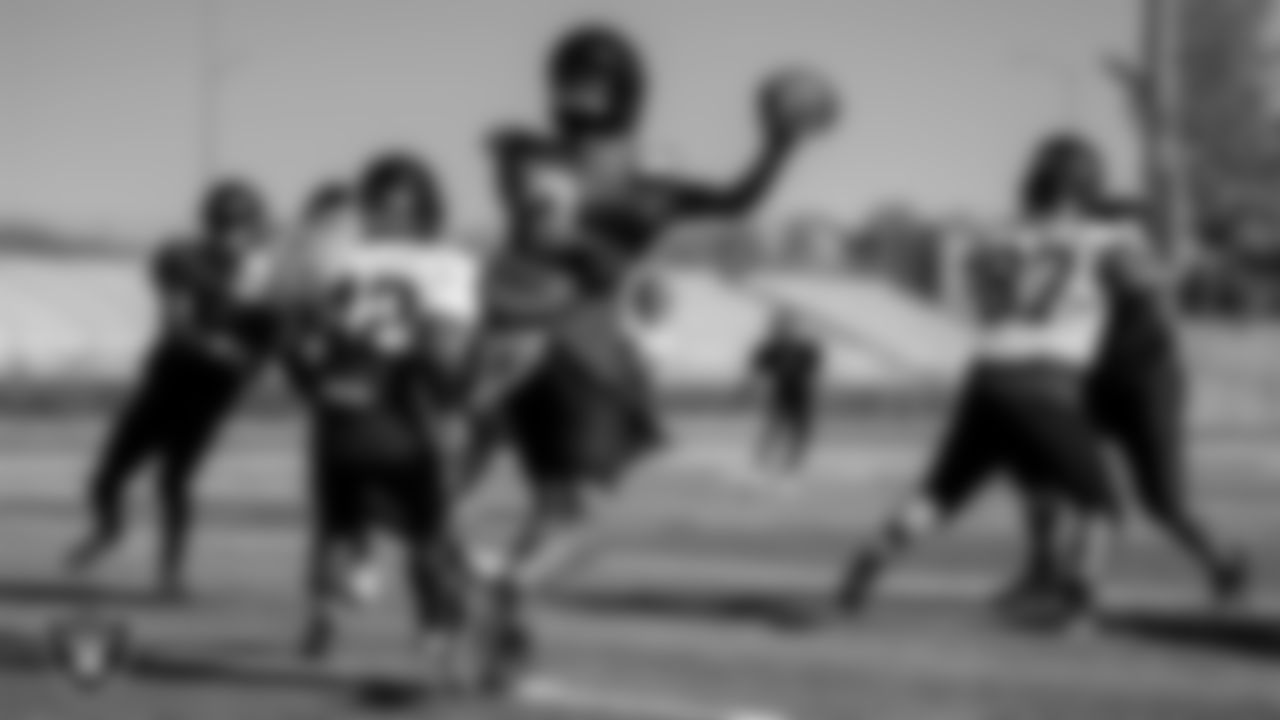 Las Vegas High School Football players run though a play during practice at Las Vegas High School.