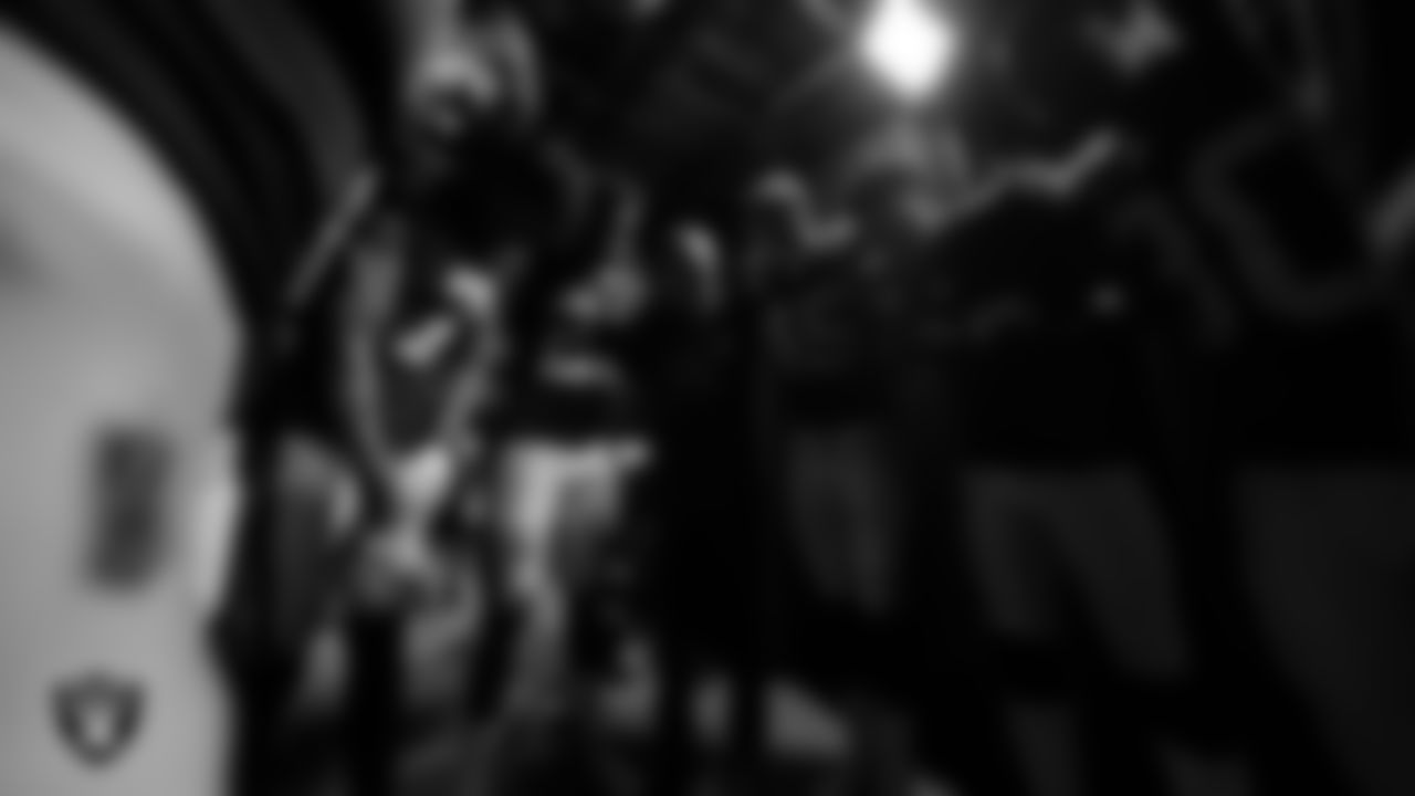The Las Vegas Raiders returners huddle in the tunnel before the regular season home game against the Kansas City Chiefs.