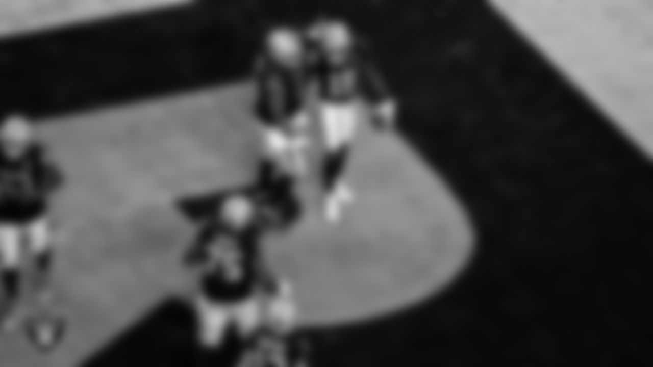 Las Vegas Raiders wide receiver Nelson Agholor (15) is congratulated by center Rodney Hudson (61) after a 7-yard touchdown catch during the regular season home game against the Buffalo Bills.