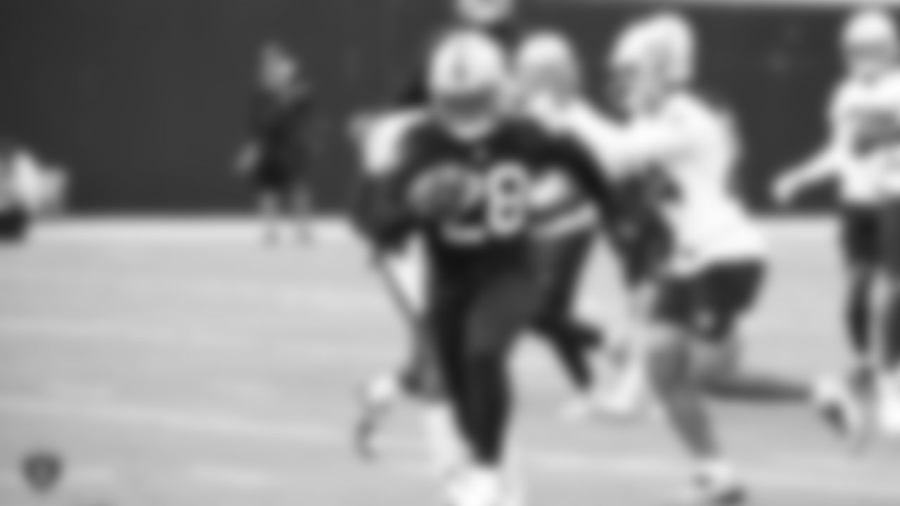 Raiders running back Josh Jacobs (28) on the field for a preseason practice.