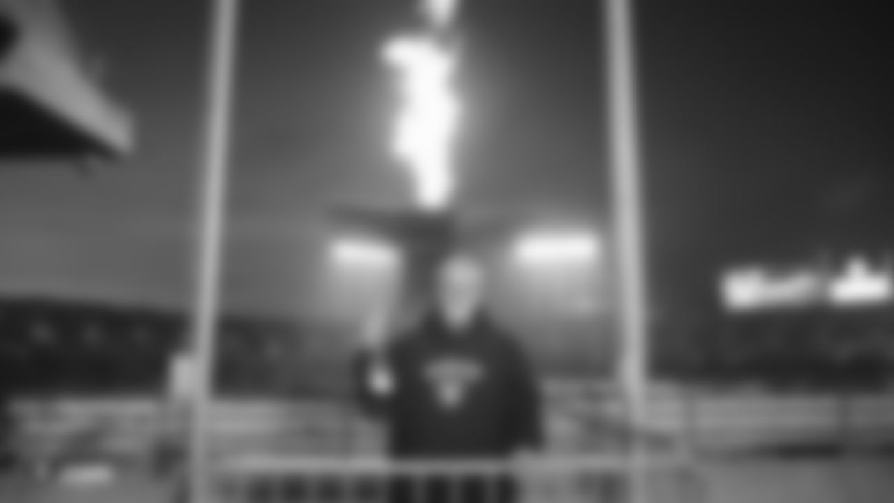 Raiders alumnus Matt Millen lights the Al Davis torch before the Raiders regular season game against the Los Angeles Chargers.
