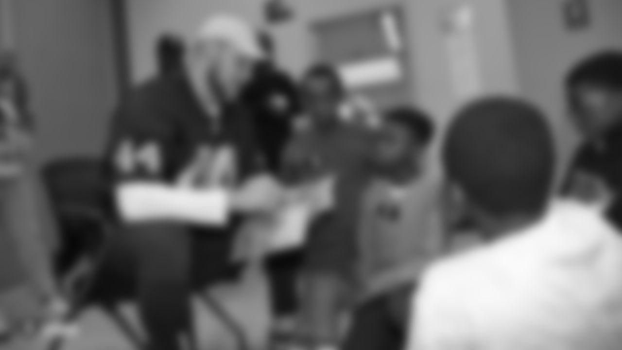 Oakland Raiders defensive tackle Clinton McDonald and his Light Into Darkness Foundation, along with linebacker Emmanuel Lamur, linebacker Kyle Wilber, punter Johnny Townsend, defensive tackle Frostee Rucker, and fullback Ryan Yurachek, partner with the nonprofit First Book by hosting a reading party to promote literacy at the West Oakland Youth Center, Tuesday, December 11, 2018, in Oakland, California.
